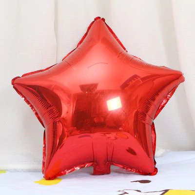 Star shape foil balloons in Super Mario theme colors